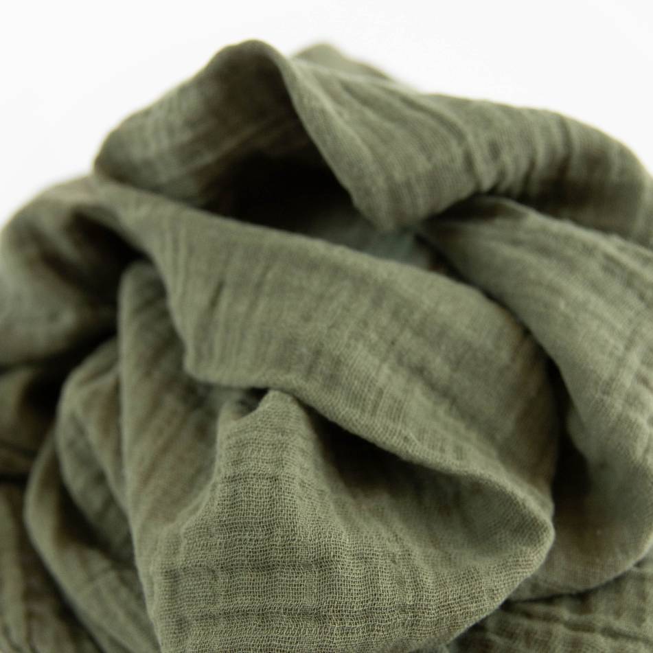 Lightweight 100% cotton muslin swaddle in Fern, 120cm x 120cm, perfect for snug and safe wrapping for infants 0-3 months.