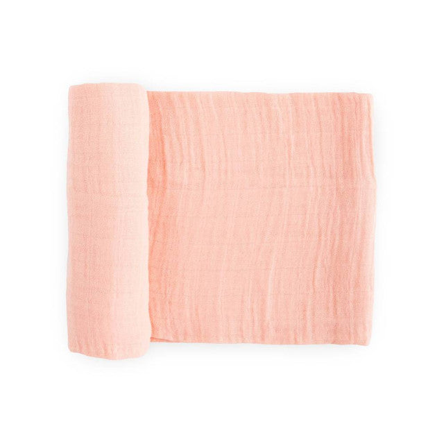 Lightweight cotton muslin swaddle in Rose Petal color, perfect for comfort, nursing, and safe sleep for newborns.