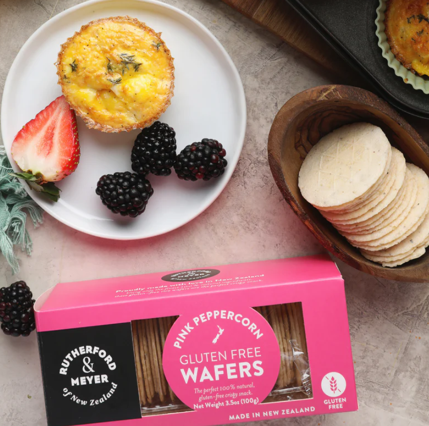 Rutherford & Myer Pink Peppercorn Wafers, gluten-free, light & crispy with a unique pink peppercorn flavor. Perfect for snacks or gifts.
