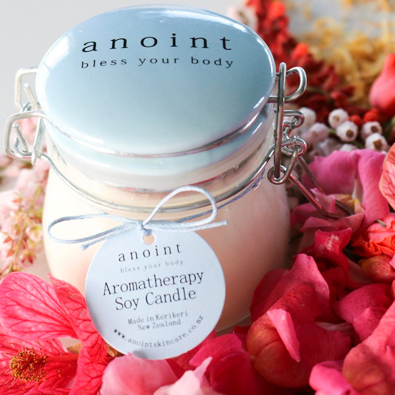 Anoint Aromatherapy Soy Candle with essential oils, natural adornments, and crystals for serenity and relaxation.