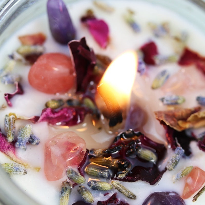 Anoint Aromatherapy Soy Candle featuring essential oils, crystals, and natural ingredients for a calming and serene ambiance.