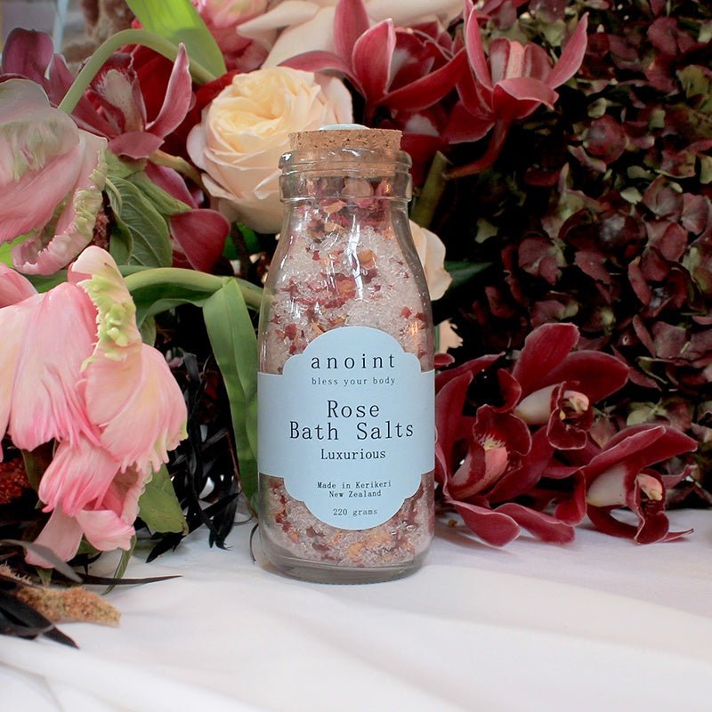 Luxurious Anoint Rose Bath Salts with Epsom salts, rose petals, and essential oil for a calming and rejuvenating bath experience.
