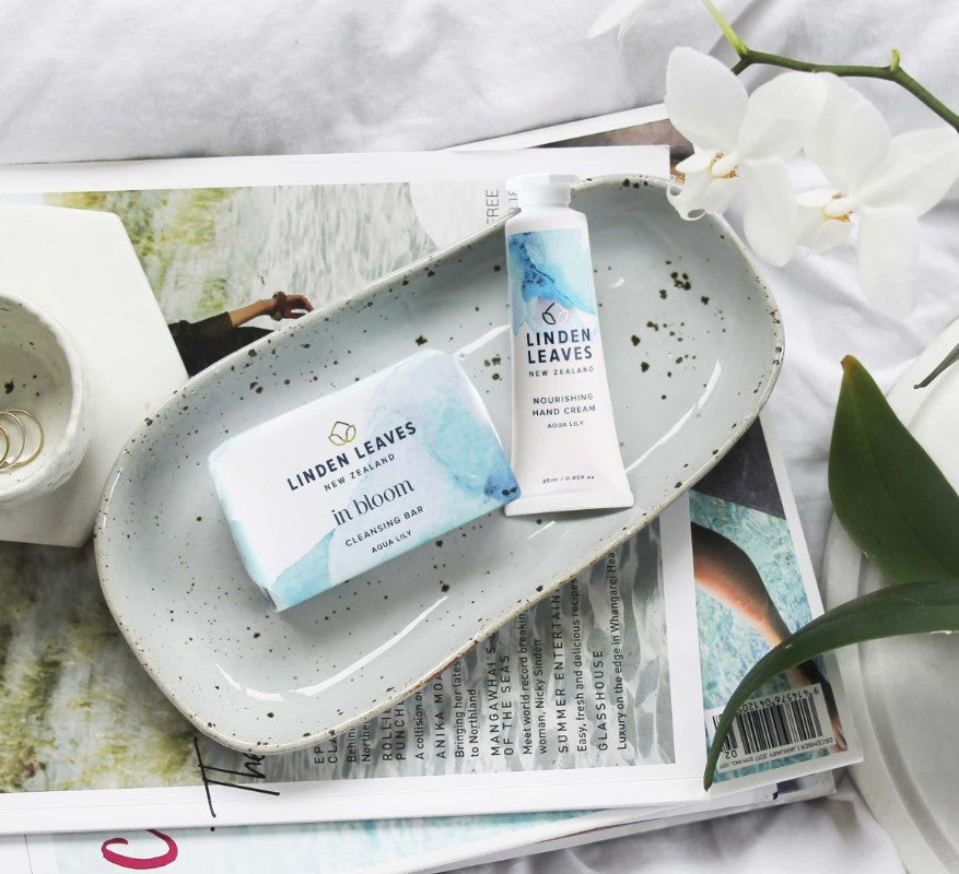 Linden Leaves Aqua Lily Hand Cream & Cleansing Bar Set, featuring nourishing formula and creamy texture for soft, rejuvenated skin.