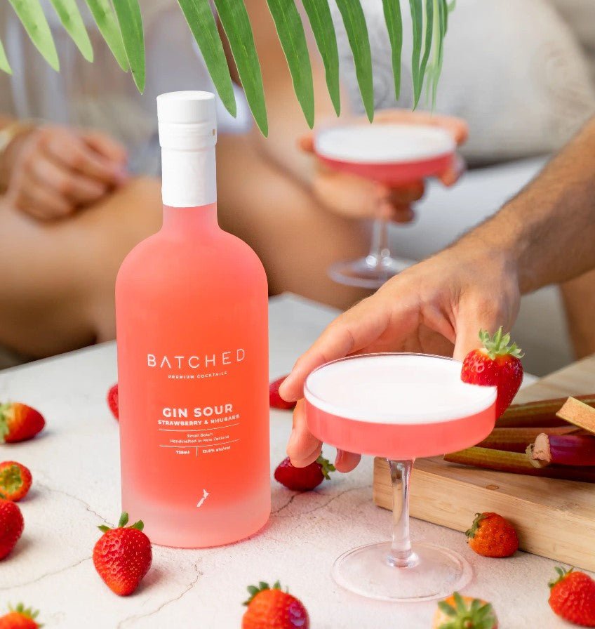 Batched Gin Sour Strawberry & Rhubarb 725ml bottle, showcasing a blend of sweet strawberries and tangy rhubarb for cocktails.