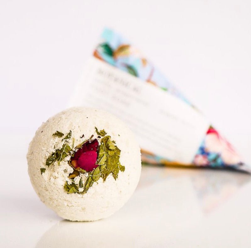 Fizzy foot soak blend of Epsom salts, green clay, and almond oil for revitalizing tired feet and ankles.