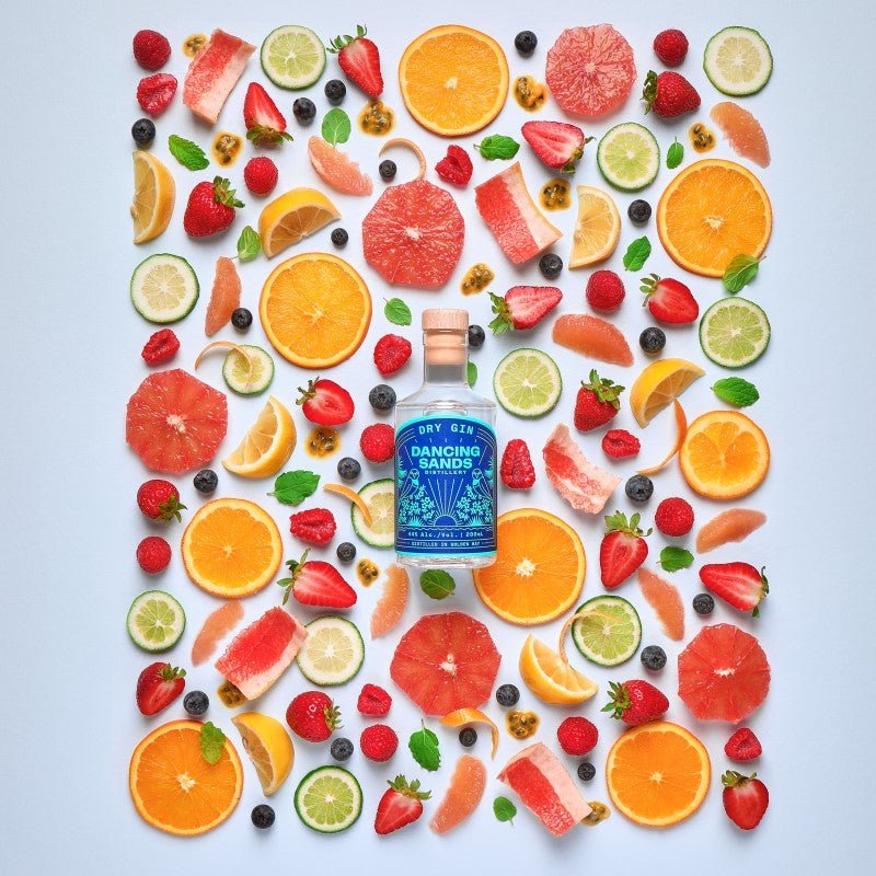 Dancing Sands Dry Gin 200ml bottle showcasing aromatic green manuka leaves, juniper, and exotic spices for a unique flavor experience.