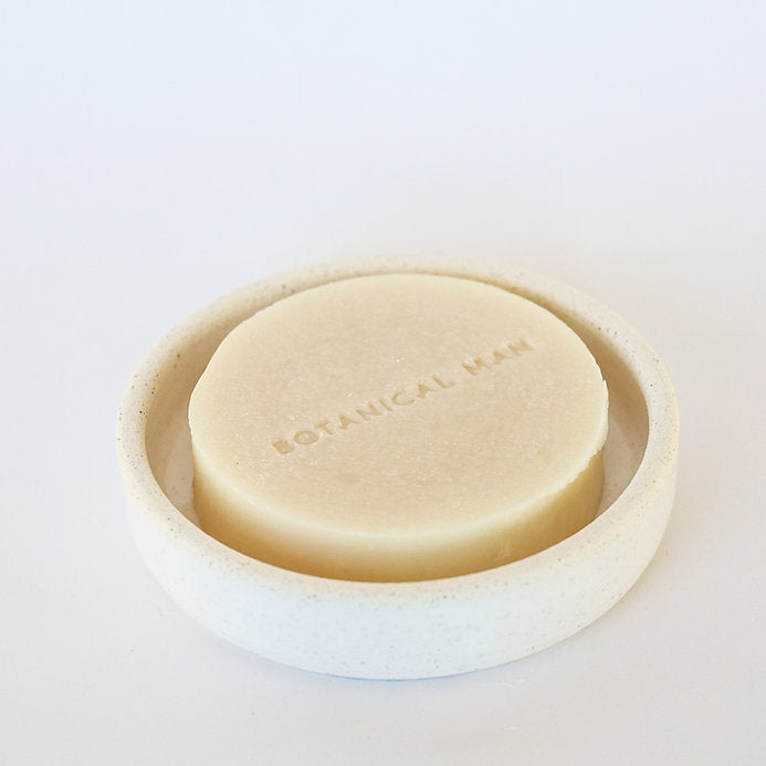 Luxurious Botanical Man Shaving Soap with Tea Tree, Shea Butter, and Kaolin Clay for a smooth, nourishing shave.