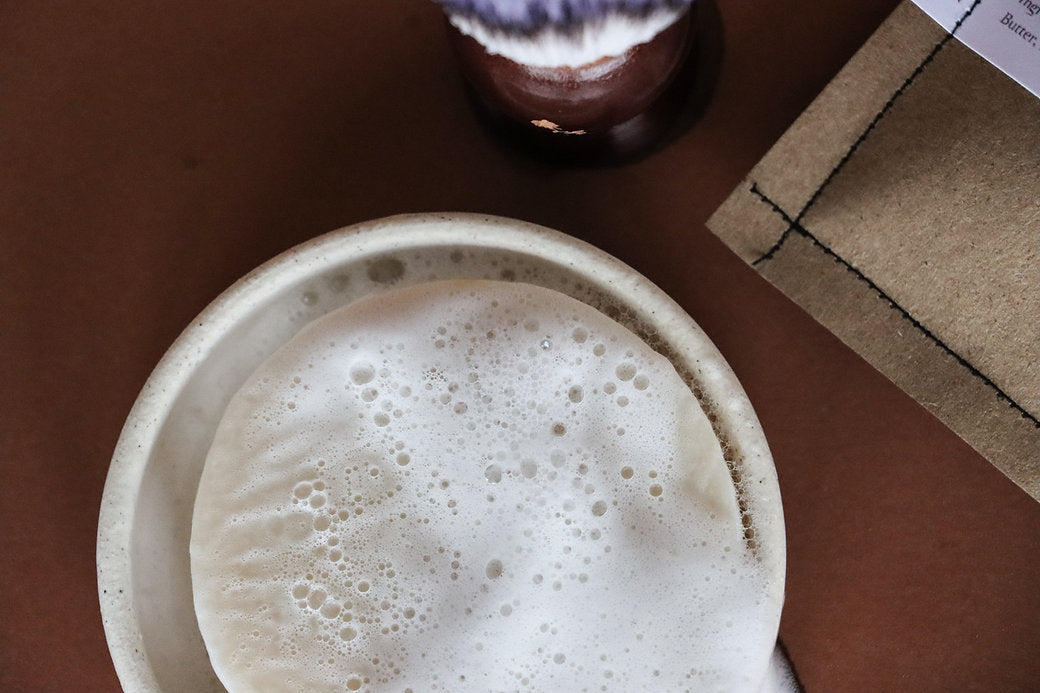 Luxurious Botanical Man Shaving Soap with Tea Tree, Shea Butter, and Kaolin Clay for a smooth, hydrating shave.