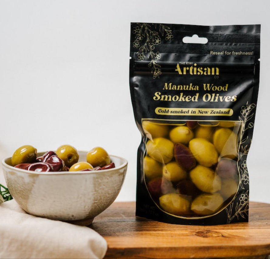 Kiwi Artisan Manuka Wood Smoked Olives 150g, cold-smoked with Manuka wood, rich aroma, ideal for gourmet snacking or gifting.