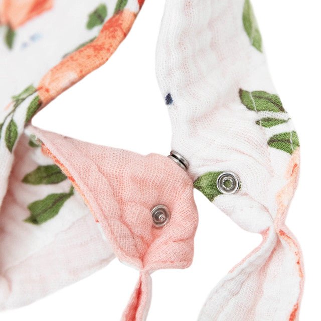 Reversible bandana bib featuring Watercolour Roses design, made of soft, absorbent cotton muslin for stylish, comfortable wear.