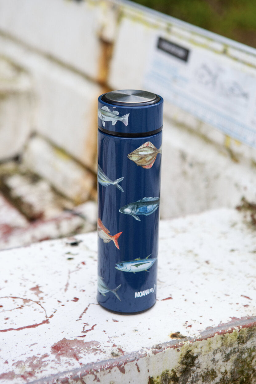 Moana Road NZ 500ml fishing drink bottle featuring vibrant fish graphics, designed for outdoor hydration and style.