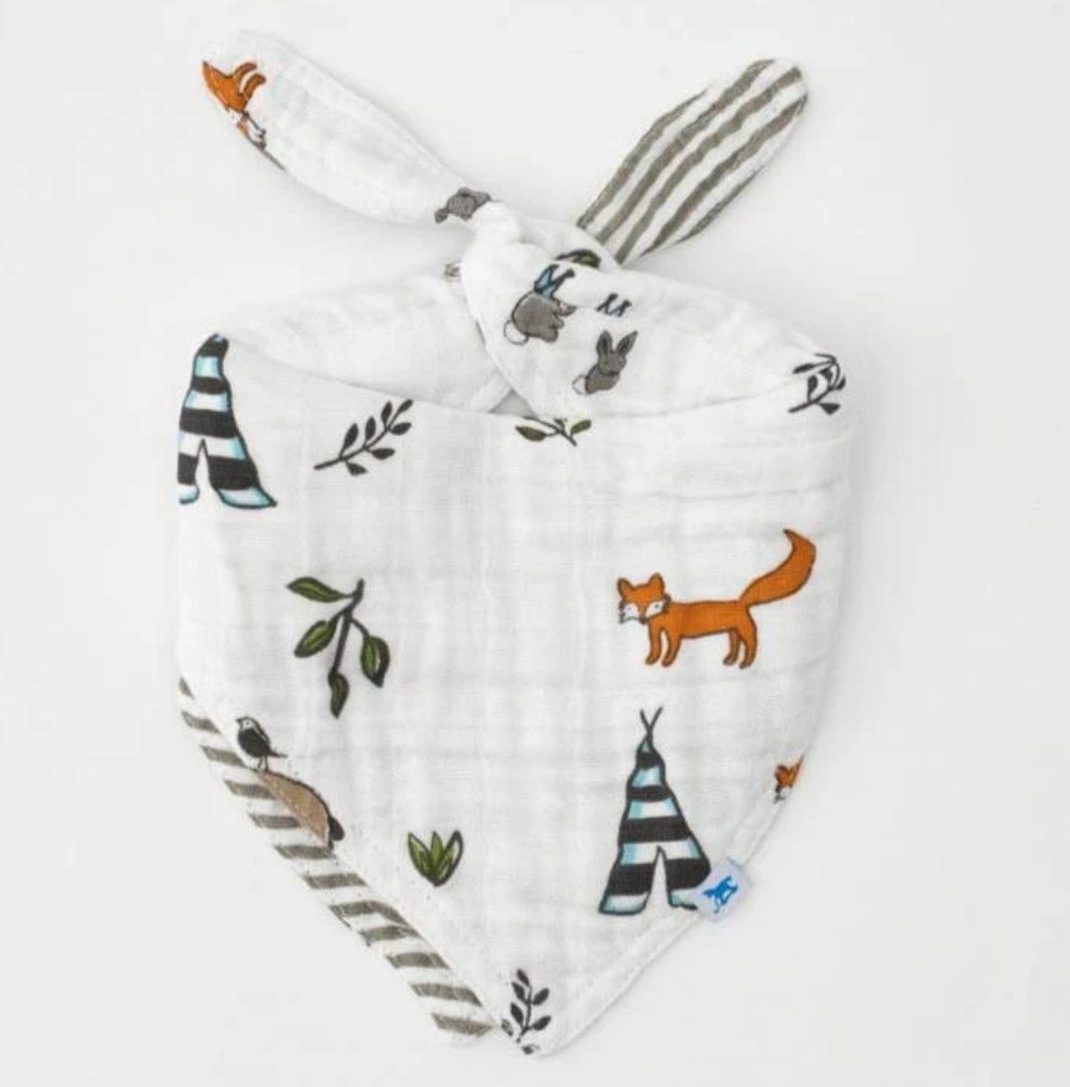"Oh Baby! gift box with essential baby care items, including soothing balm, swaddle, rattle, and elegant packaging."