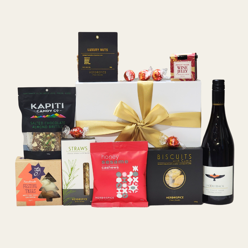 Luxurious Christmas Celebration Gift Box filled with gourmet treats including fine wines, chocolates, and savory snacks.