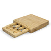 Elegant square bamboo cheese board with slide-out drawer, includes cheese knives and fork for stylish serving.