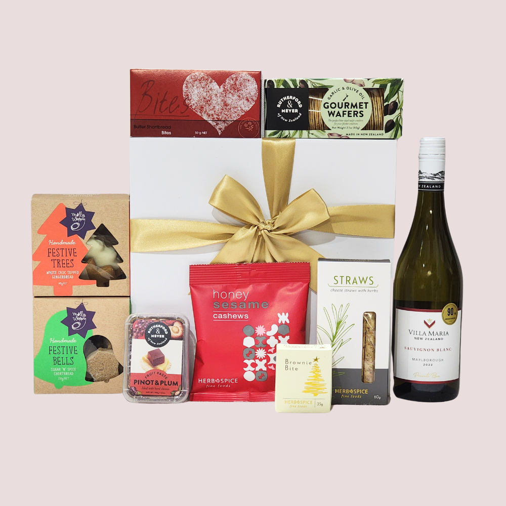 Aotearoa Christmas Gift Box filled with gourmet Kiwi treats, including cookies, wine, and savory snacks for festive celebrations.