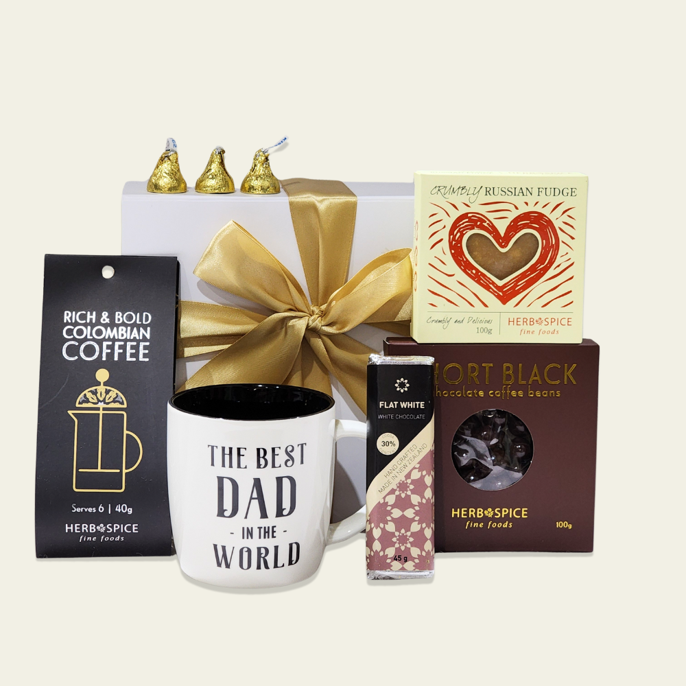 Gift box for coffee-loving dads featuring a mug, Colombian coffee, chocolates, and more, elegantly packaged for any occasion.