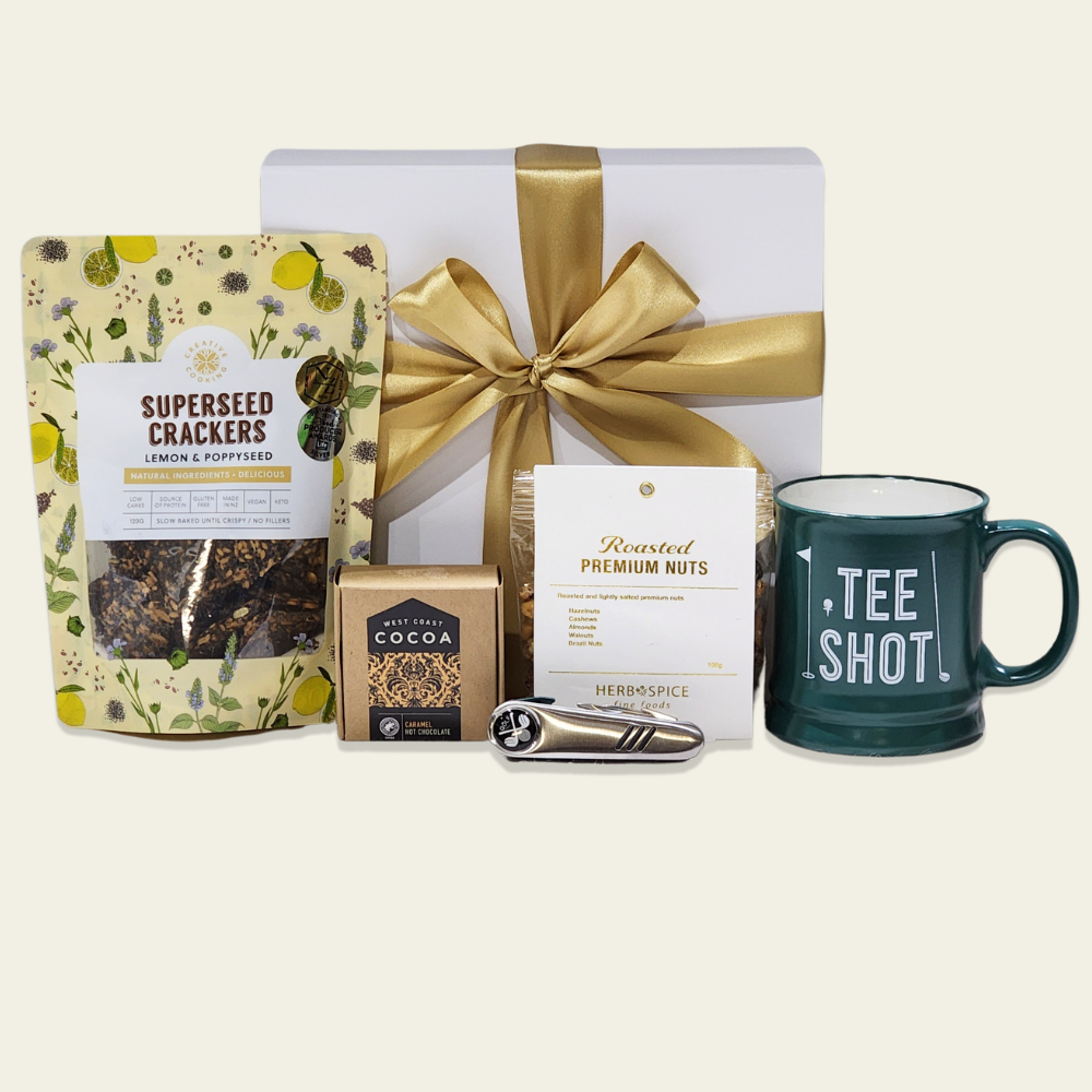 Golf Lover's Gourmet Gift Box featuring a mug, tools, snacks, and hot chocolate, elegantly packed for golf enthusiasts.