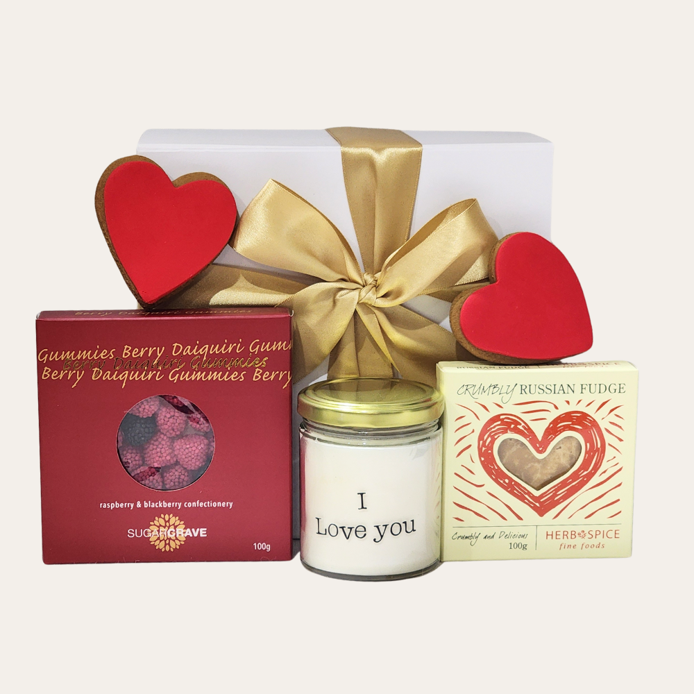 Elegant Sweetheart Gift Box featuring 'I Love You' candle, gourmet treats, and heart-shaped cookies for romantic occasions.