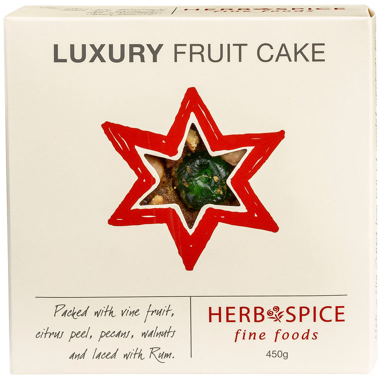 Luxury fruit cake round with vine fruits, citrus peel, pecans, walnuts, and a hint of rum, perfect for festive occasions.