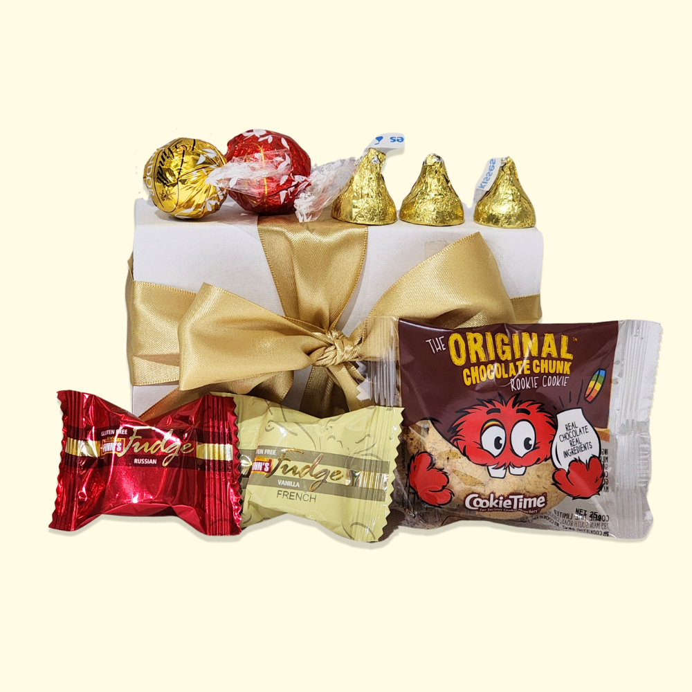 Mini Sweets & Treats gift box with assorted chocolates and fudge, wrapped in a ribbon, perfect for any occasion. Free delivery in NZ.