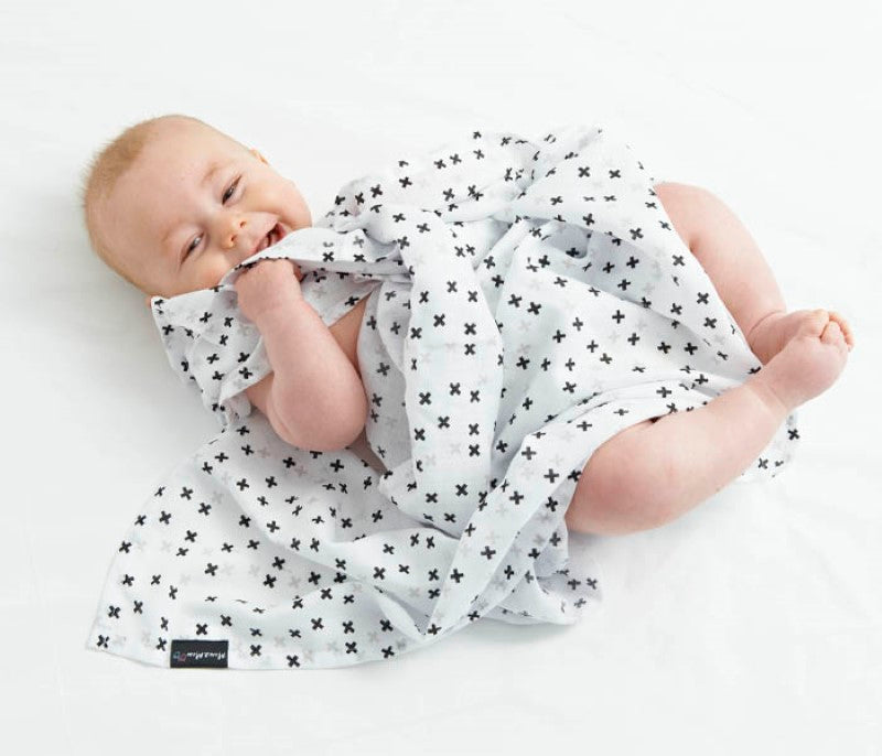 Lightweight cotton muslin blanket swaddle for babies, breathable, versatile for sun protection and privacy.