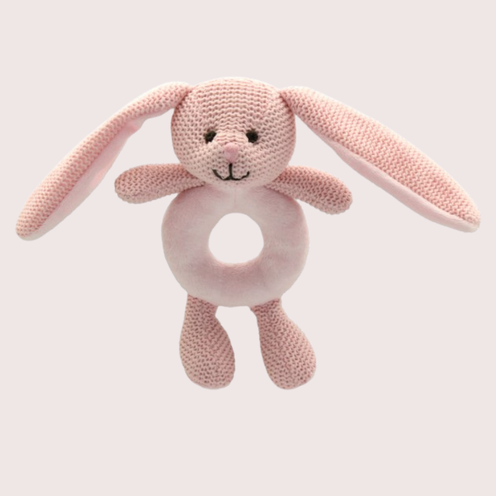 Soft pink woven bunny rattle for infants, designed for tiny hands with sensory stimulation and a gentle rattle sound.