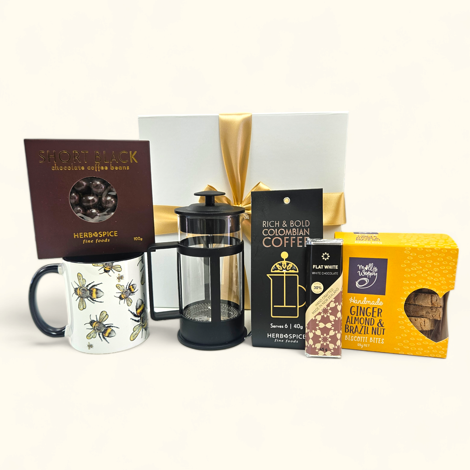 Delightful Coffee Lover Gift Box with mug, plunger, biscotti, Colombian coffee, beans, and chocolate bar, elegantly packaged.