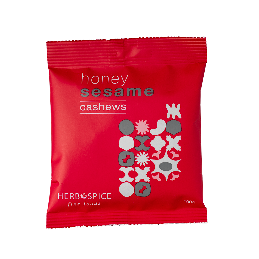 Honey Sesame Cashews: Gourmet roasted cashews glazed with honey and coated in crunchy sesame seeds for a sweet and salty snack.