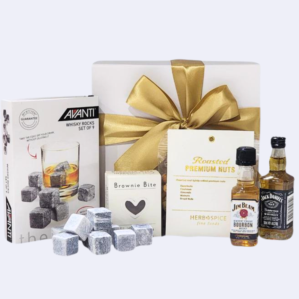 Luxurious Whisky Rocks gift box featuring reusable chilling stones, premium whiskeys, gourmet snacks, and elegant presentation.