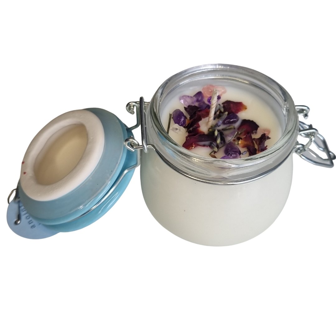 Anoint Aromatherapy Soy Candle with essential oils, natural adornments, and crystals for a serene, calming atmosphere.