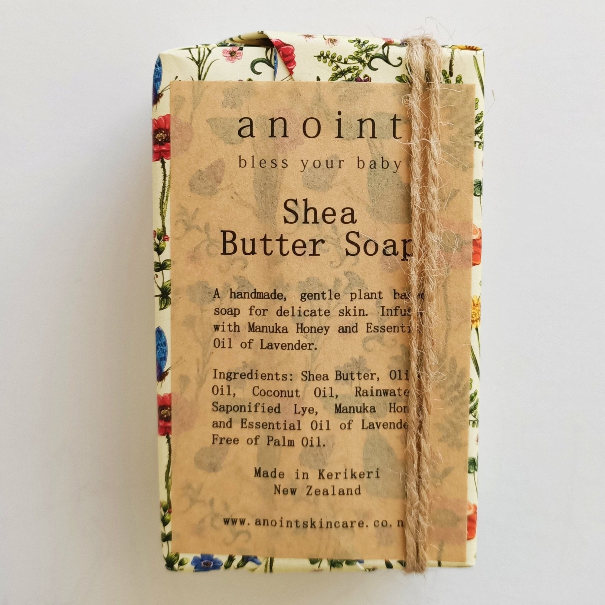 Anoint Baby Shea Butter Soap bar wrapped in botanical paper, enriched with Shea Butter and Lavender for baby’s delicate skin.