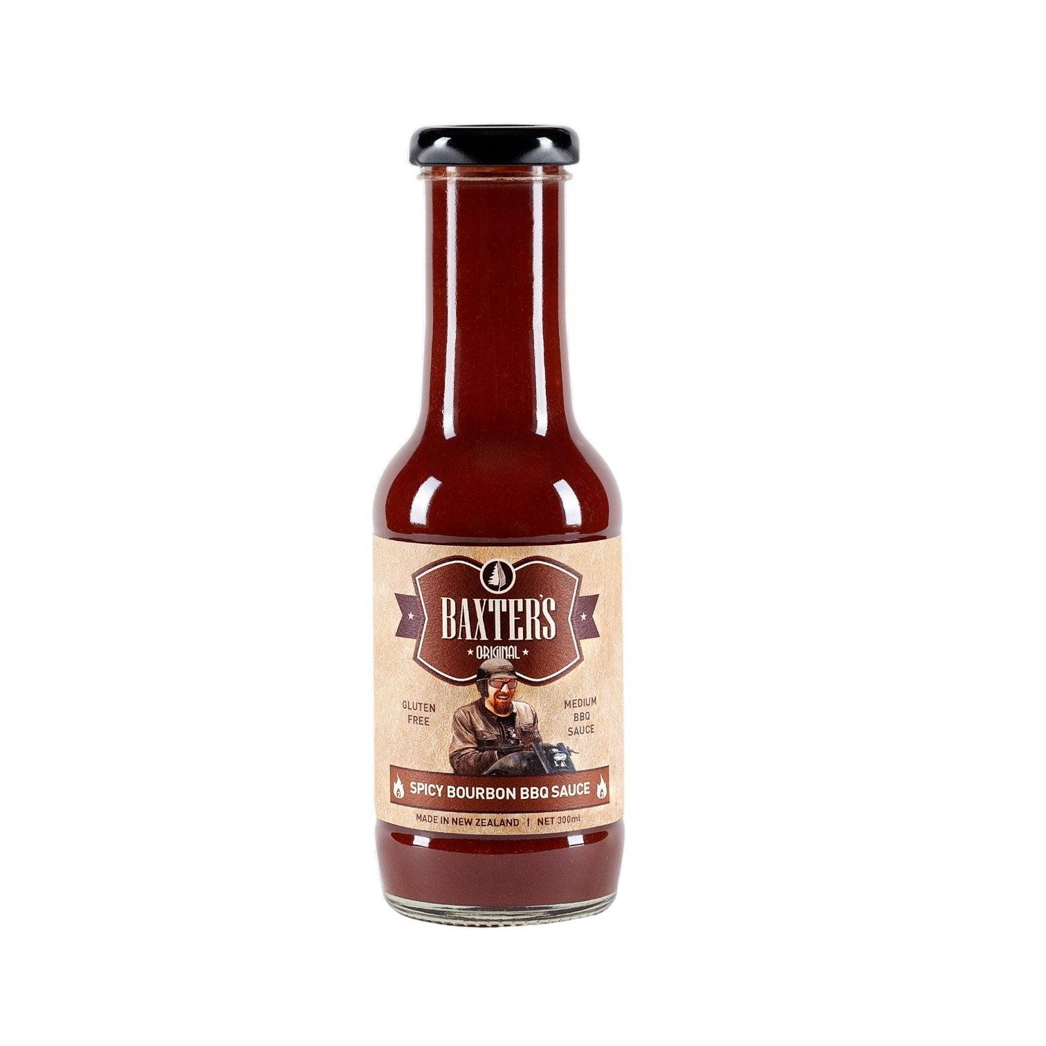 Baxter's Spicy Bourbon BBQ Sauce 300ml showcasing a blend of bourbon and chillies for a smoky, flavorful grilling experience.