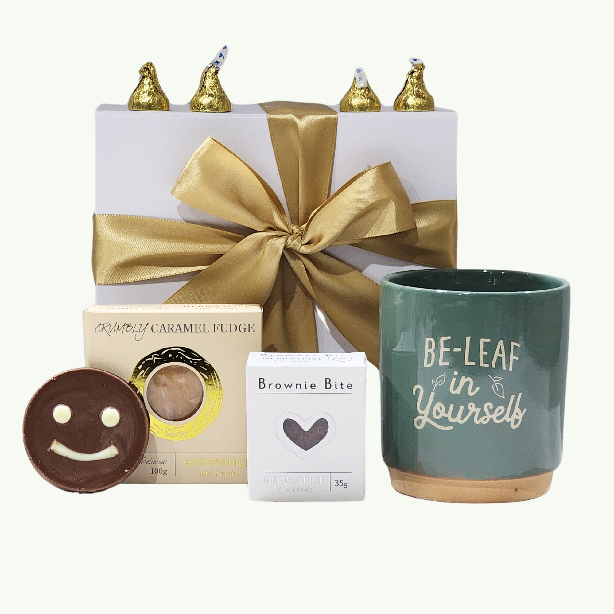 "Elegant gift box featuring an inspirational planter, sweet treats, and a ribbon, perfect for uplifting someone special."