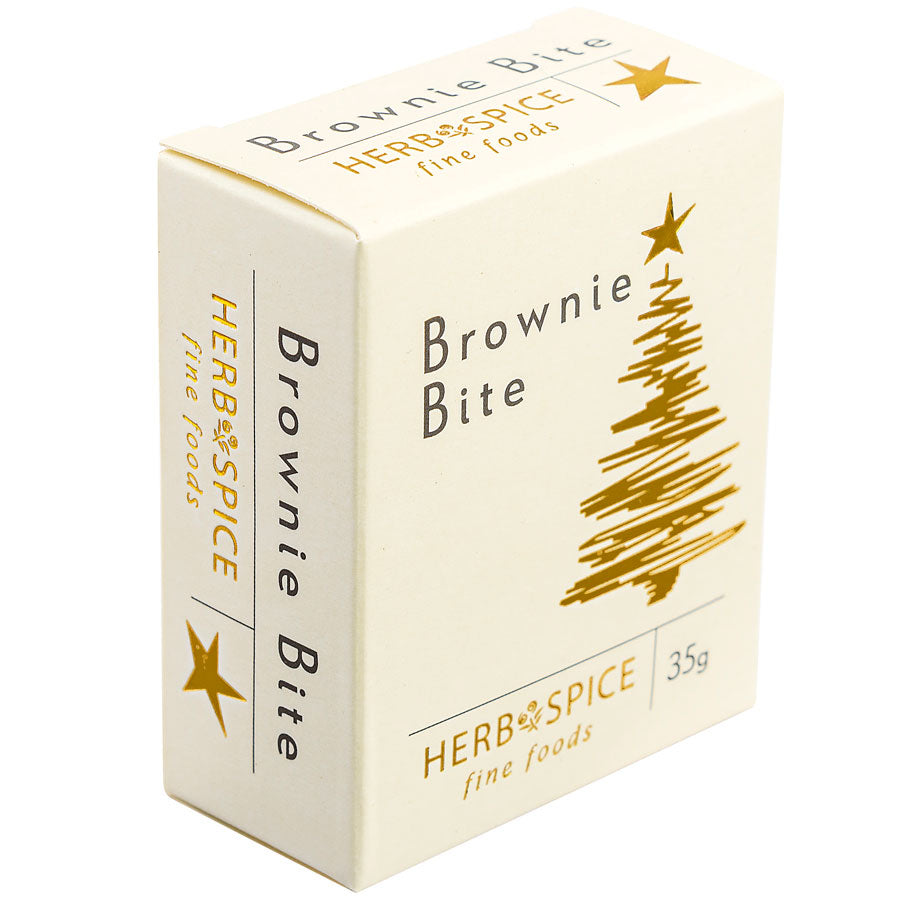 Mini chocolate brownies in festive packaging, perfect for Christmas gifting and sharing during holiday celebrations.