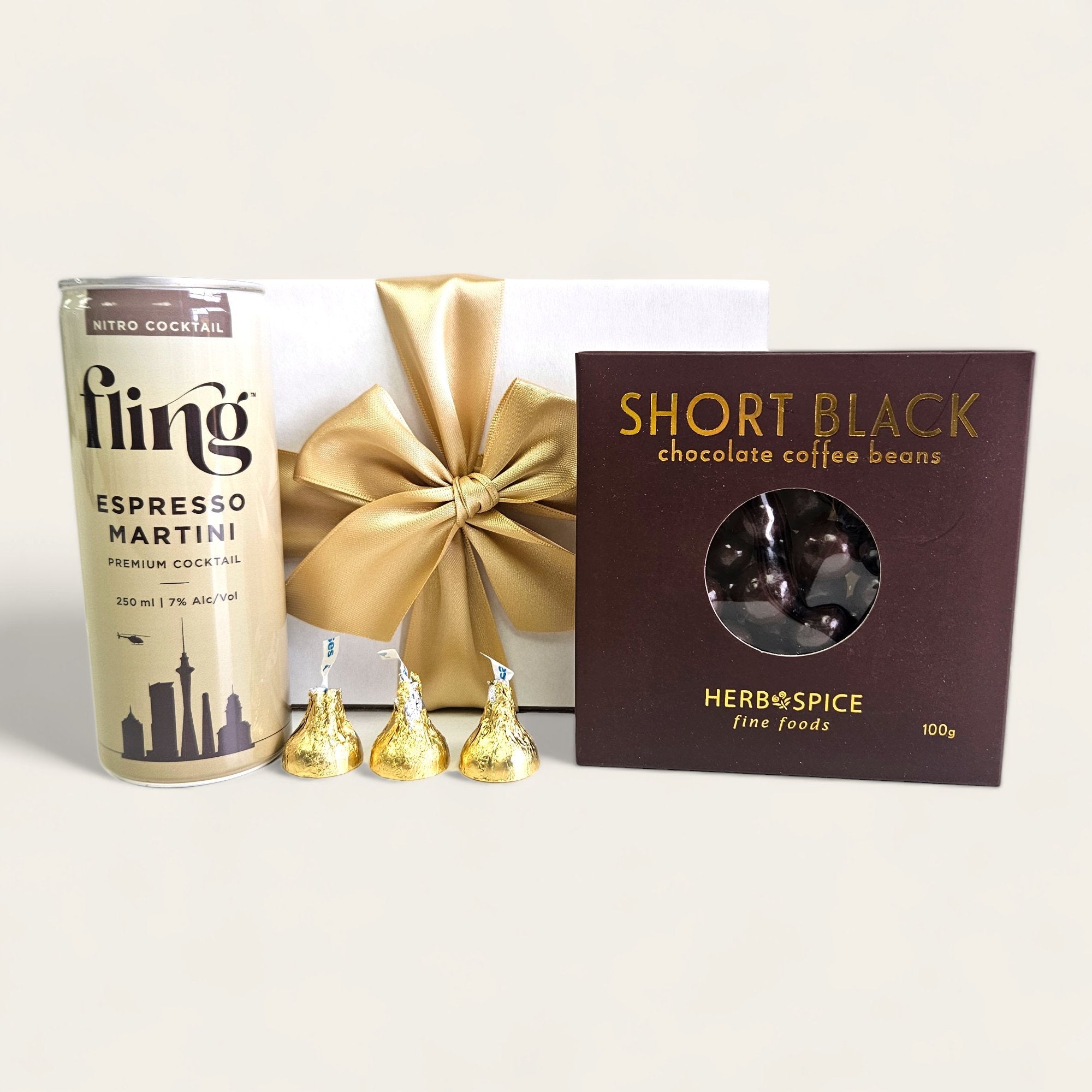 "Coffee Date gift set featuring an Espresso Martini, chocolate-coated coffee beans, Hershey's Kisses, and free nationwide delivery."