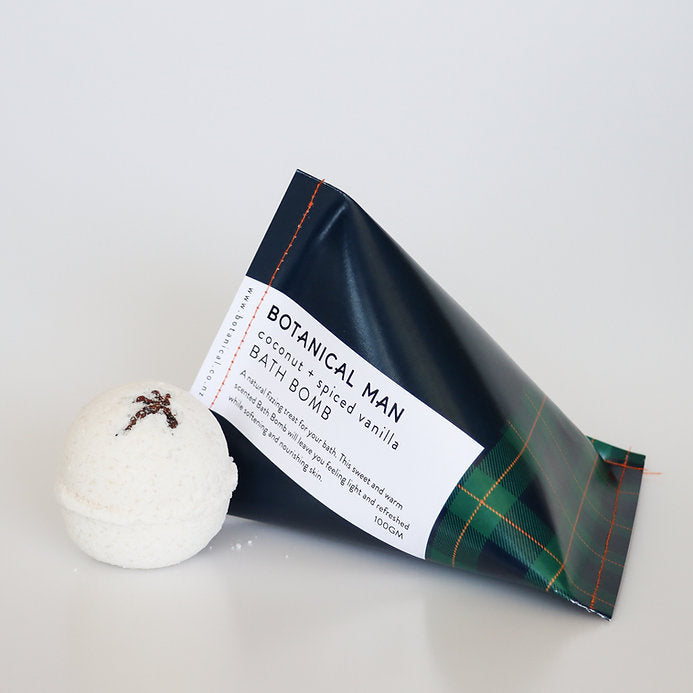 Luxurious men's bath bomb combines coconut and spiced vanilla for a relaxing, aromatic soak. Perfect for self-care.