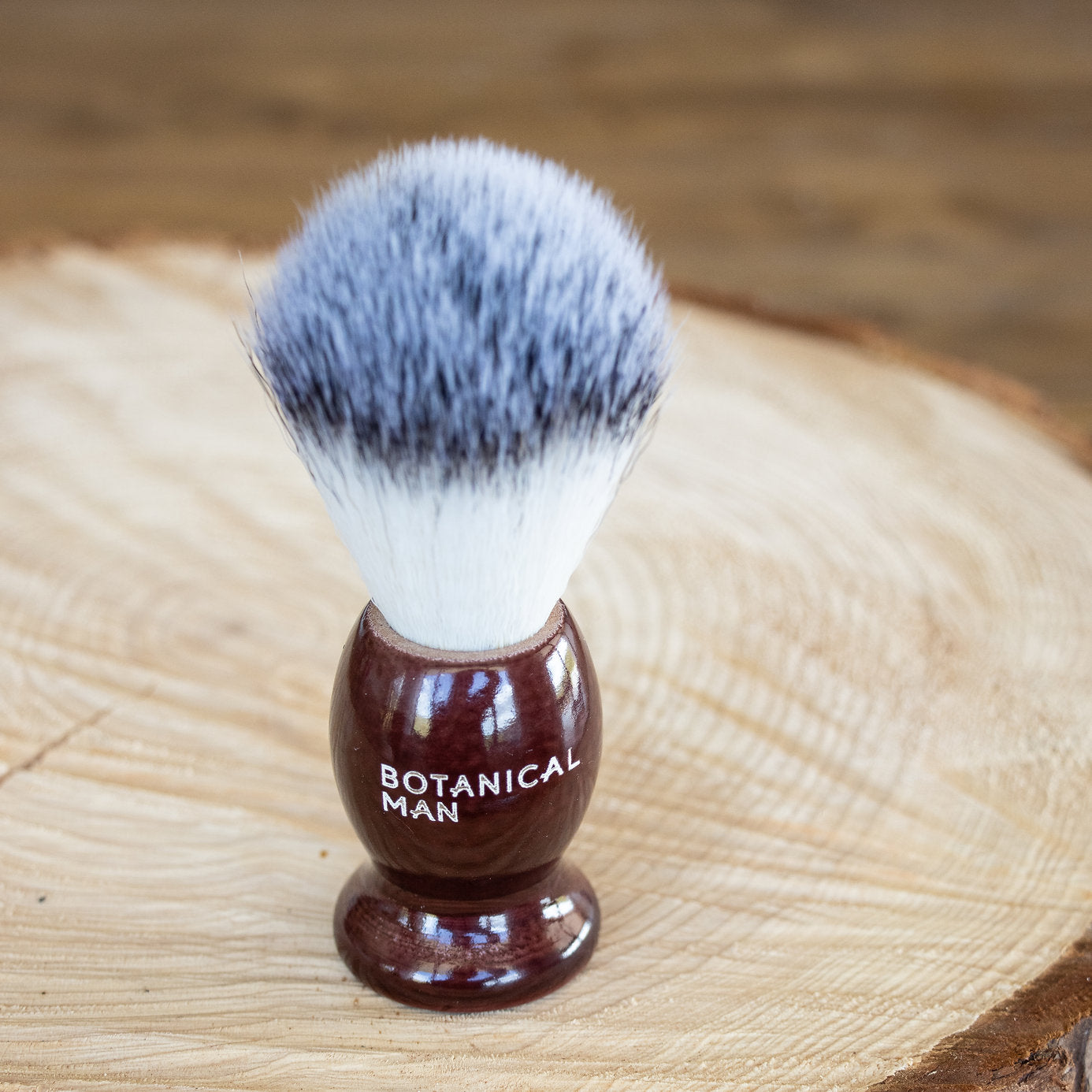 Botanical Man Shaving Brush with a rosewood handle and faux badger bristles for a luxurious grooming experience.
