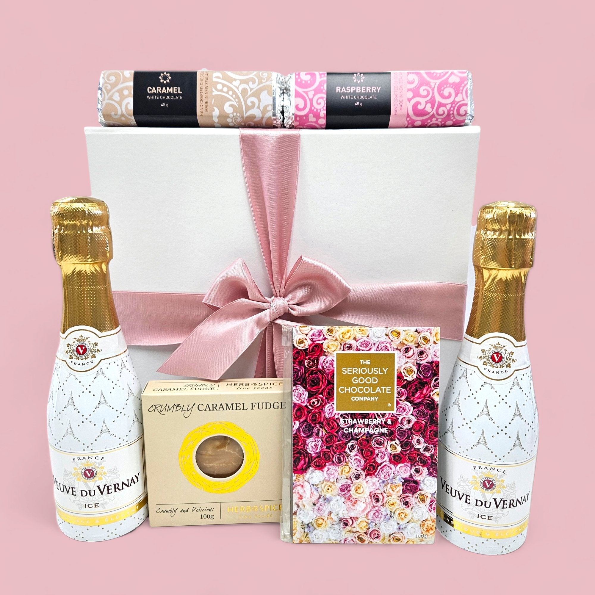 Girls' Night gift box featuring chocolates, fudge, champagne, and a beautiful presentation, perfect for cozy gatherings with friends.