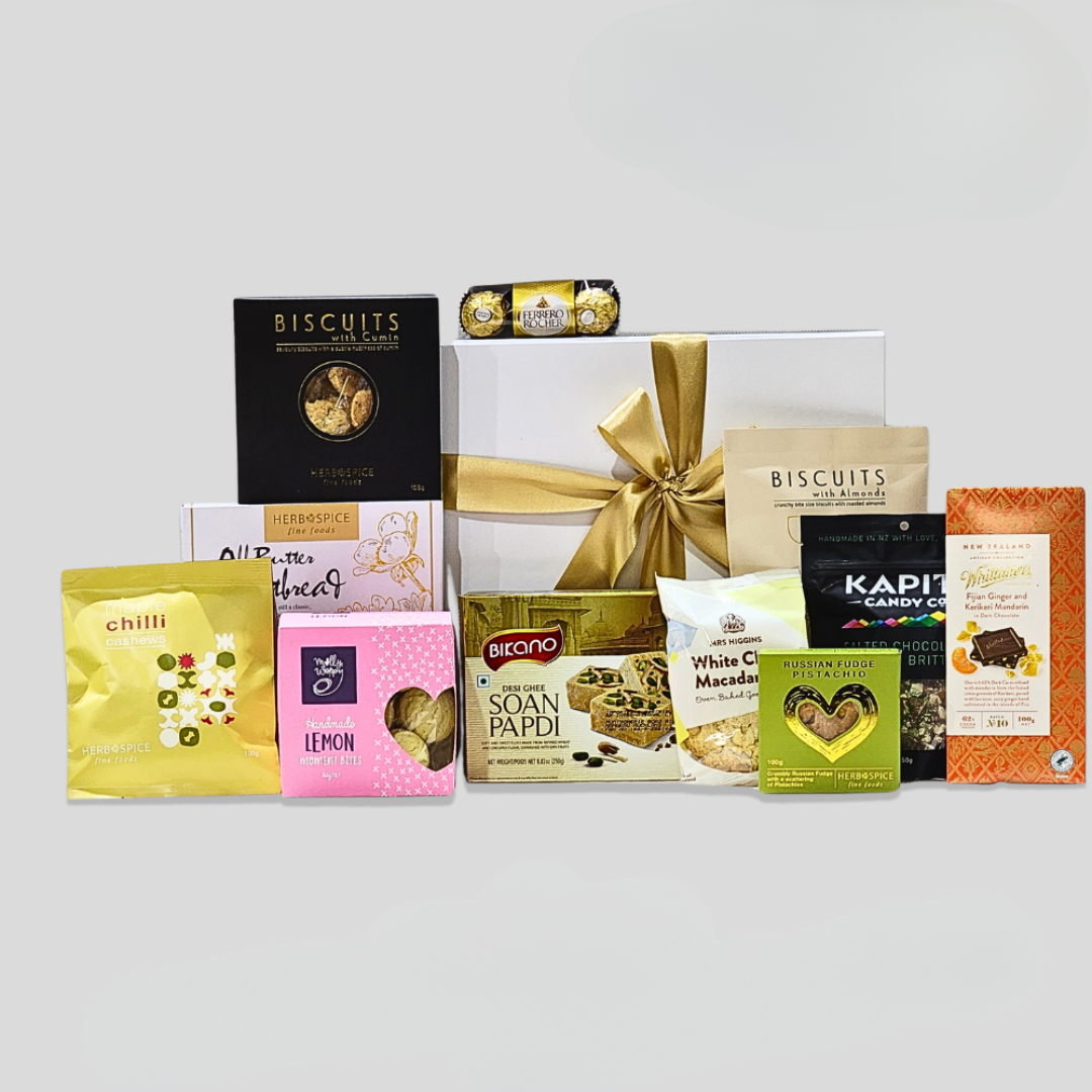 Luxurious Grand Diwali Celebration gift box featuring traditional sweets and gourmet treats for festive sharing and joy.