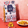 Vibrant Bombay Mix with crunchy green peas and roasted cashews, offering a gluten-free gourmet snack experience.