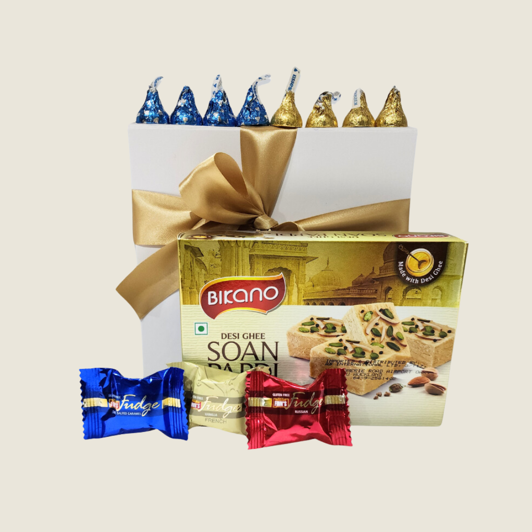 Elegant Diwali gift box featuring traditional Indian sweets, premium chocolates, and festive décor for joyful celebrations.