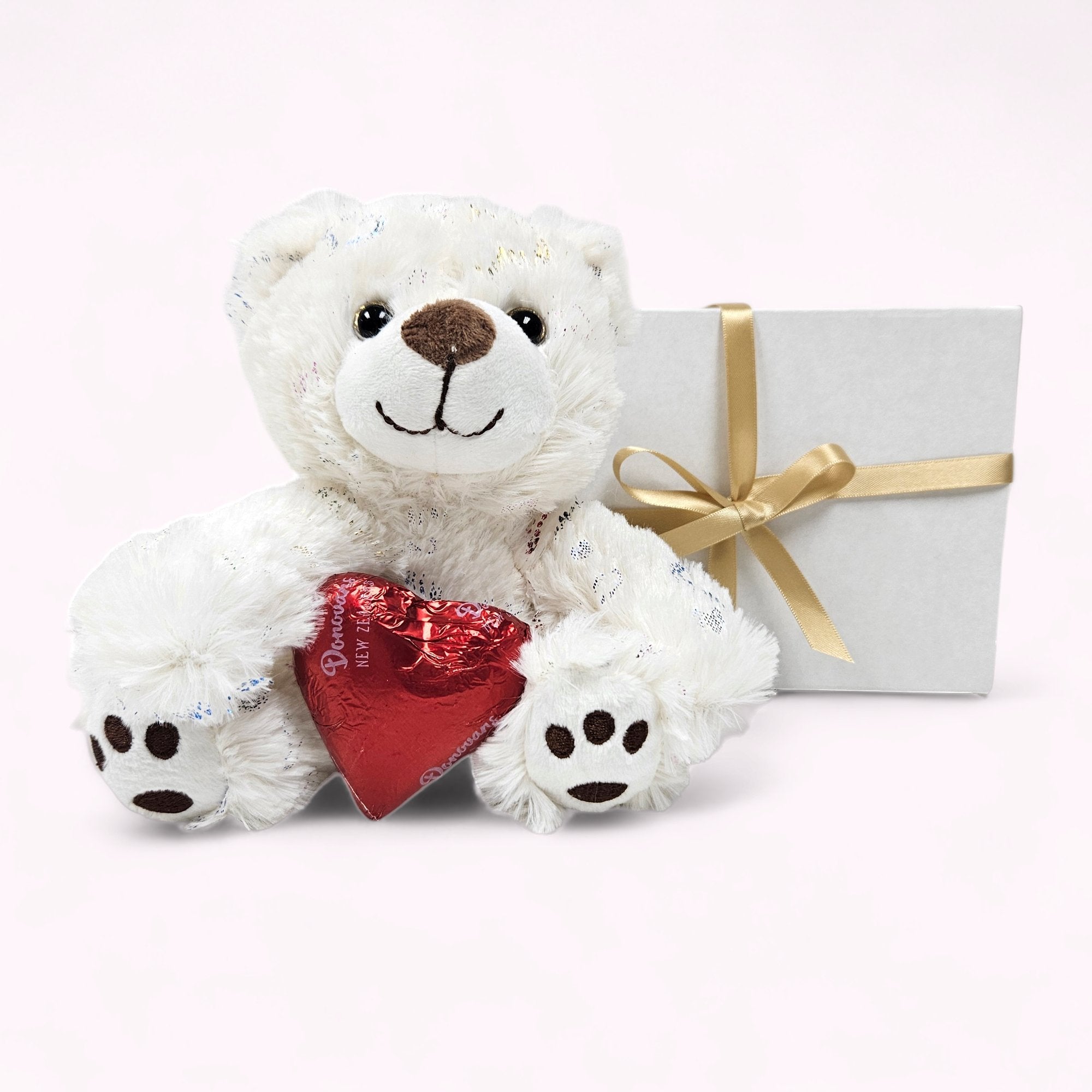 Just Because gift box featuring a heart teddy bear, chocolate, and customizable card, delivered free across NZ.