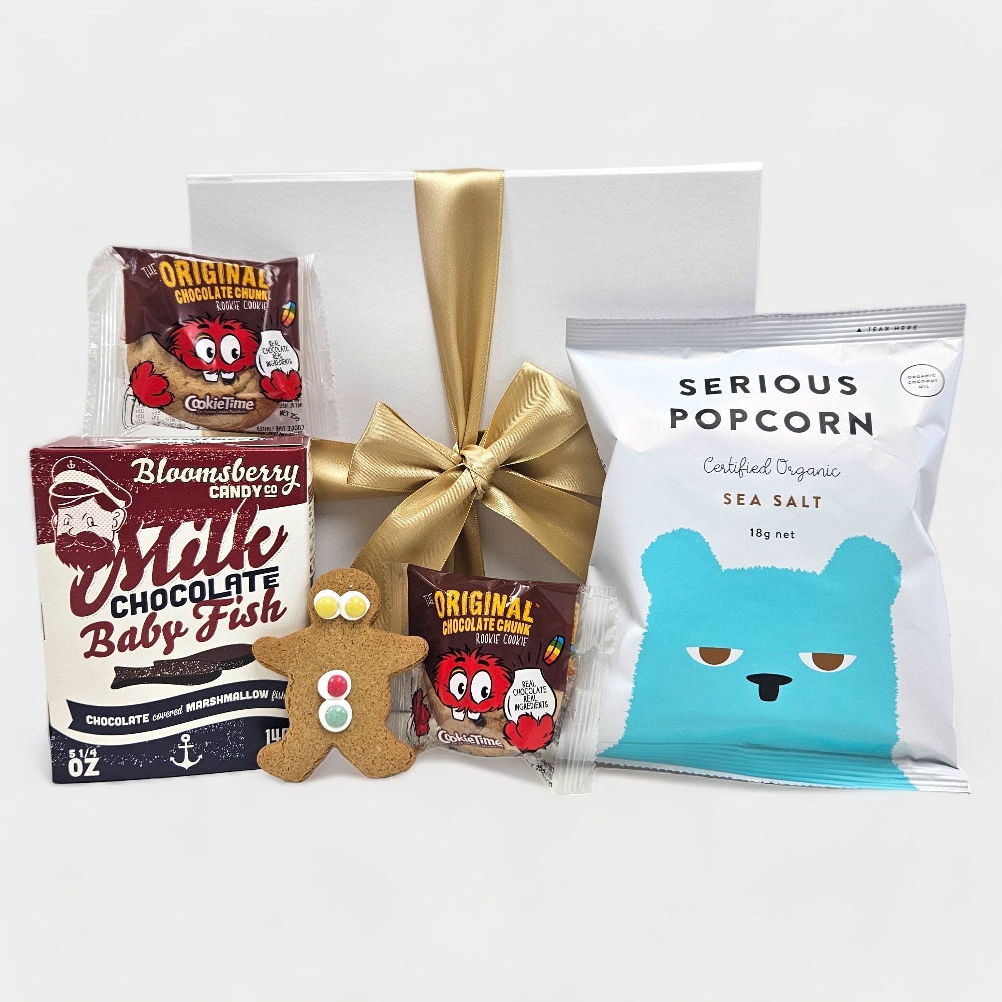 Colorful Kids Treat Box filled with sweets like popcorn, cookies, and chocolate, elegantly packaged for joyful gifting.