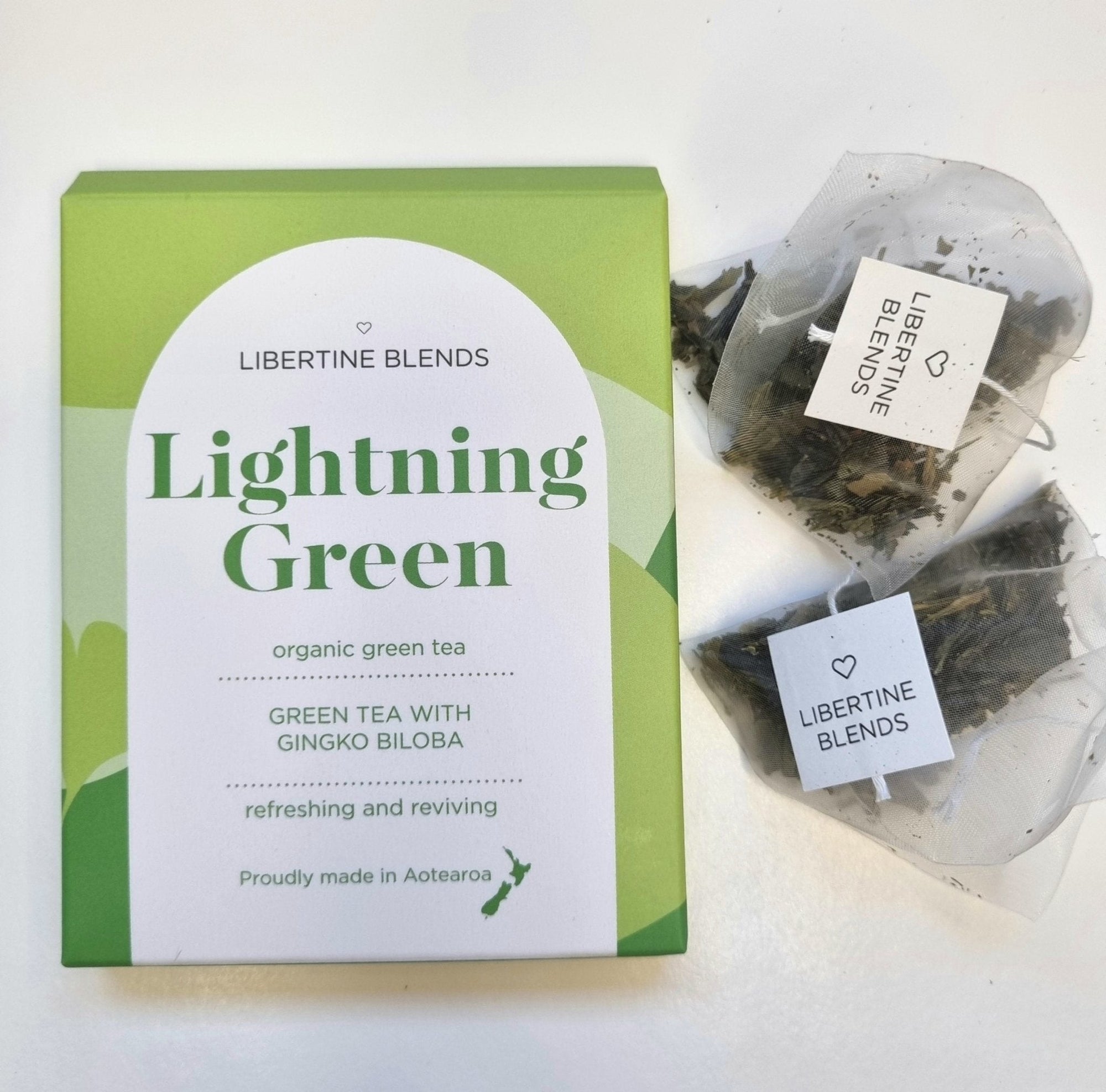 Invigorating Libertine Blends Lightening Green Tea in two tea temples, crafted with Sencha and Ginkgo Biloba for a refreshing experience.