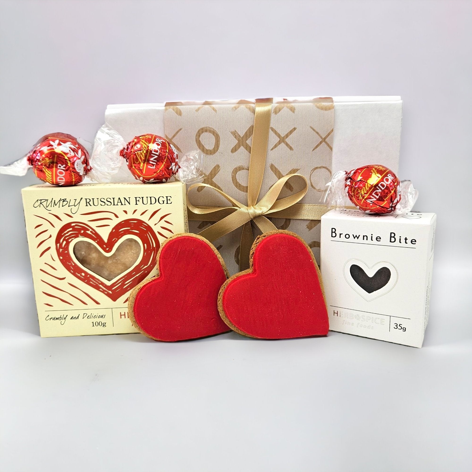 "Mini gift box with chocolates, ginger biscuits, and fudge, perfect for birthdays and special occasions, with free NZ delivery."