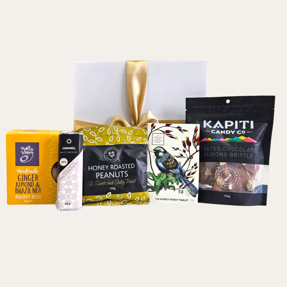 Gourmet Delights Diwali Box featuring sweet and savory treats in an elegant gift box, perfect for sharing during the festival.