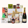 Luxurious Very Merry Christmas Gift Box filled with gourmet treats, including champagne, cookies, chocolates, and festive delights.