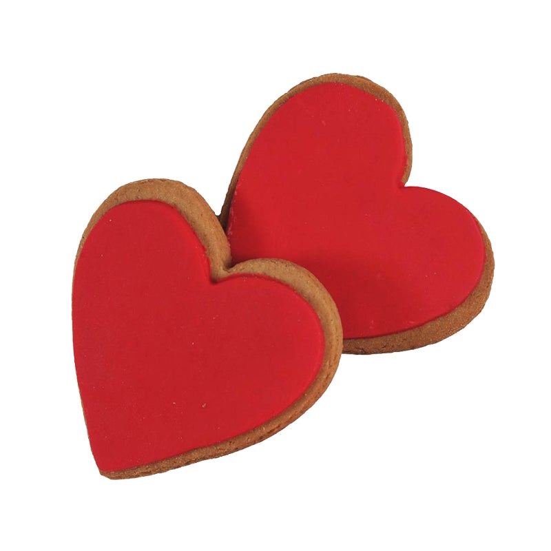 Heart-shaped ginger cookies with red icing, perfect for gifting and celebrating special occasions. Made in New Zealand.