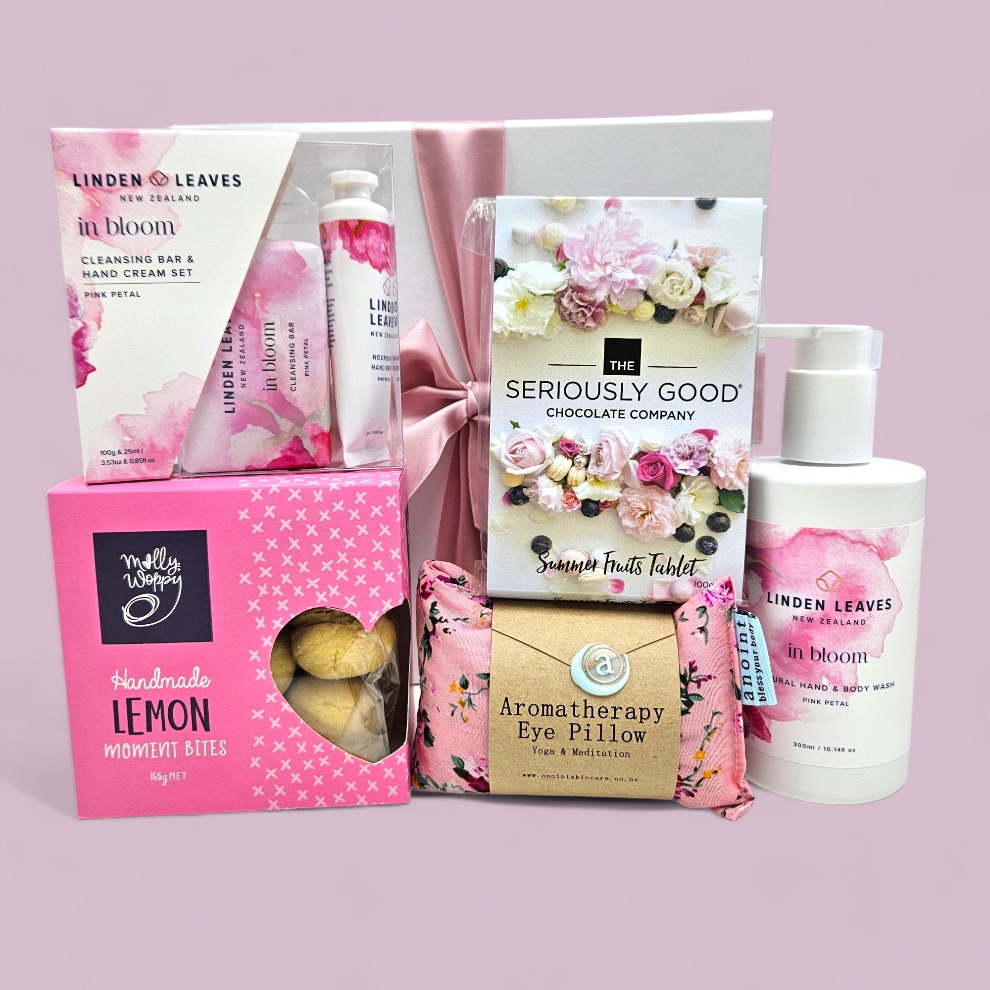 Luxurious gift box 'She Deserves It' with pampering skincare, treats, and aromatherapy for the special woman in your life.